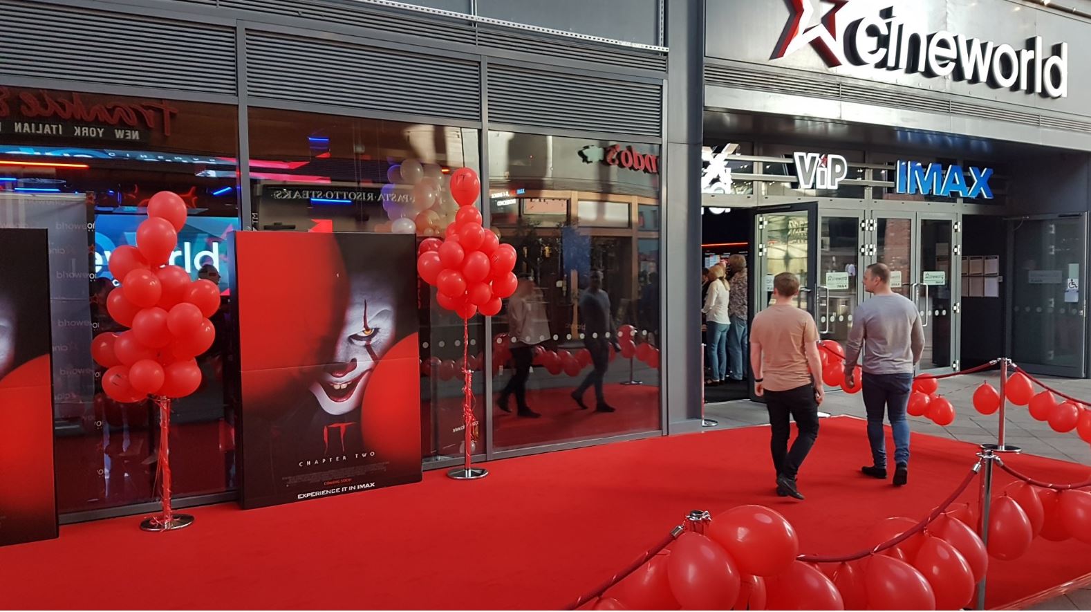 Red carpet at Cineworld with promotional poster for film IT